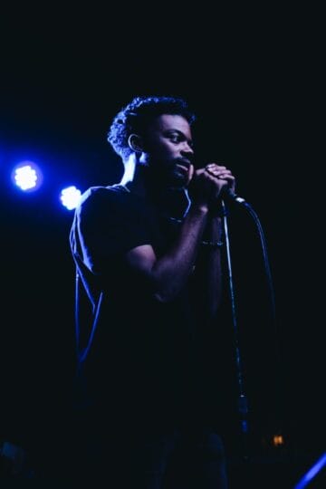 Man on stage with microphone